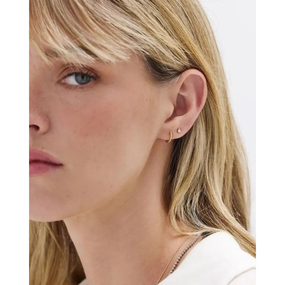 Charming Petite Diamond Huggie Earrings.