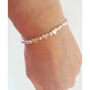 Charming Silver Heart Stretch Bracelet - Perfect Beaded Stacking Gift for Girlfriend or Teacher.