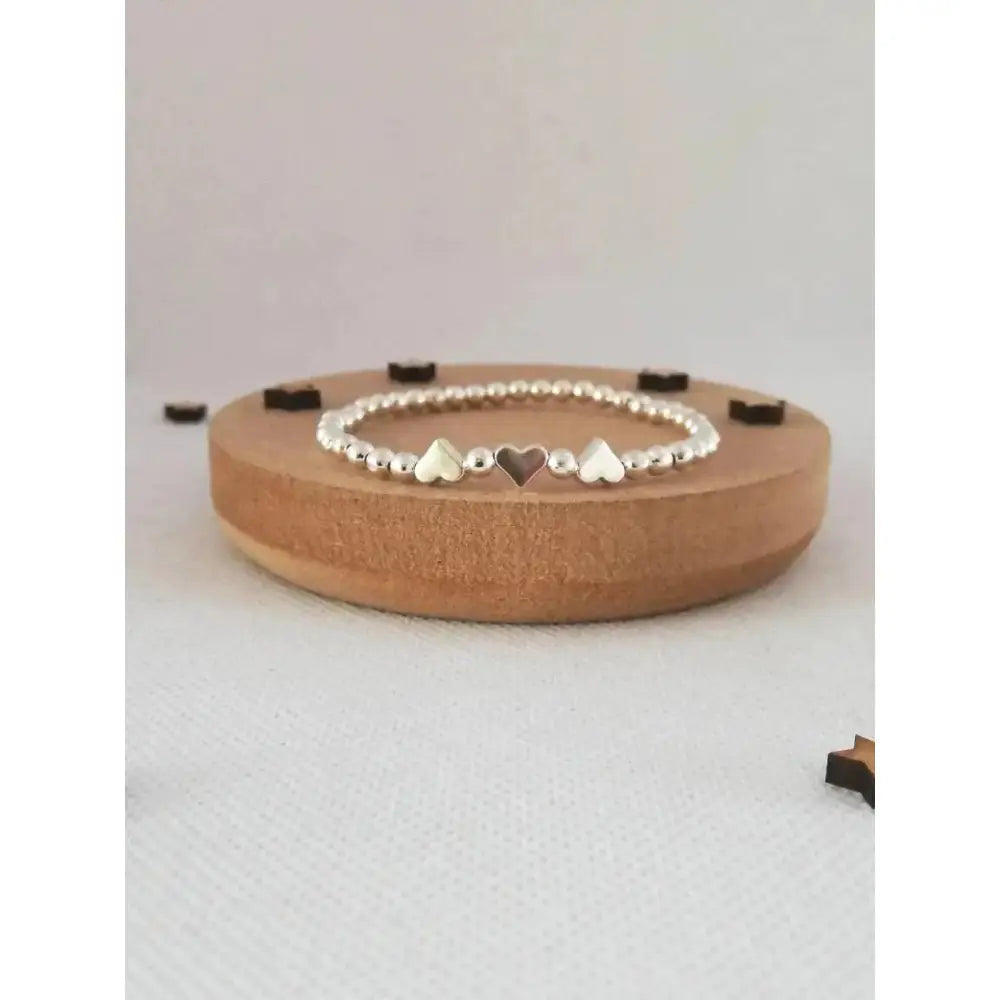 Charming Silver Heart Stretch Bracelet - Perfect Beaded Stacking Gift for Girlfriend or Teacher.