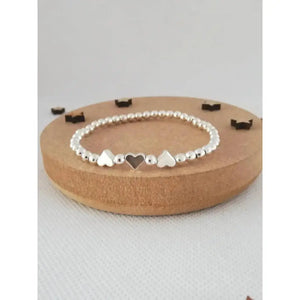 Charming Silver Heart Stretch Bracelet - Perfect Beaded Stacking Gift for Girlfriend or Teacher.