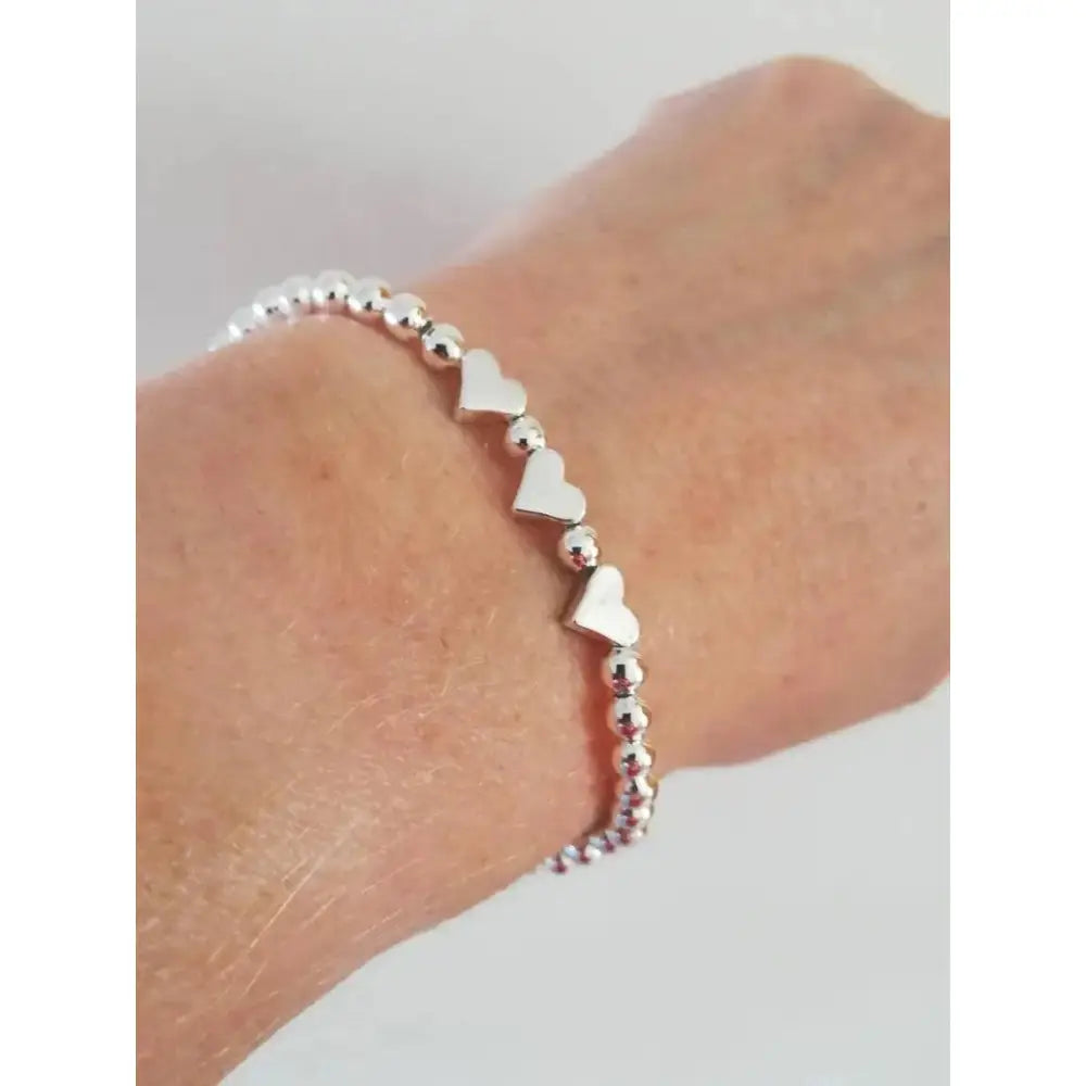 Charming Silver Heart Stretch Bracelet - Perfect Beaded Stacking Gift for Girlfriend or Teacher.