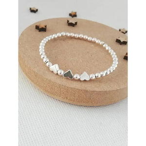 Charming Silver Heart Stretch Bracelet - Perfect Beaded Stacking Gift for Girlfriend or Teacher.