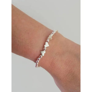 Charming Silver Heart Stretch Bracelet - Perfect Beaded Stacking Gift for Girlfriend or Teacher.