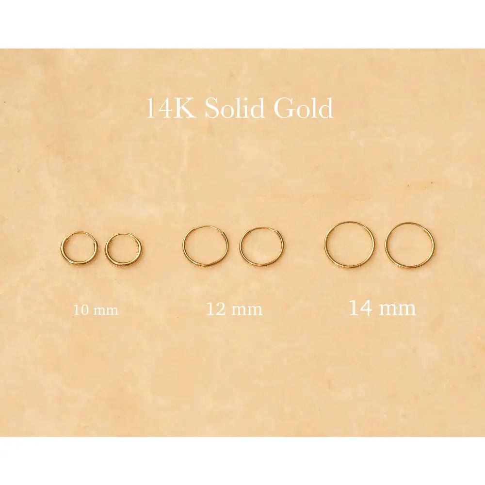 Chic 14K Solid Gold Endless Hoop Earrings - Elegant Tiny Huggie Hoops for Every Occasion.