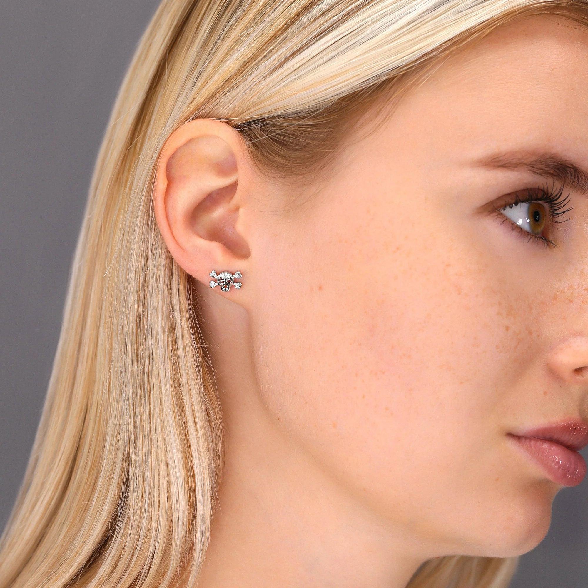 Dazzling CZ Skull and Bones Sterling Silver Stud Earrings.