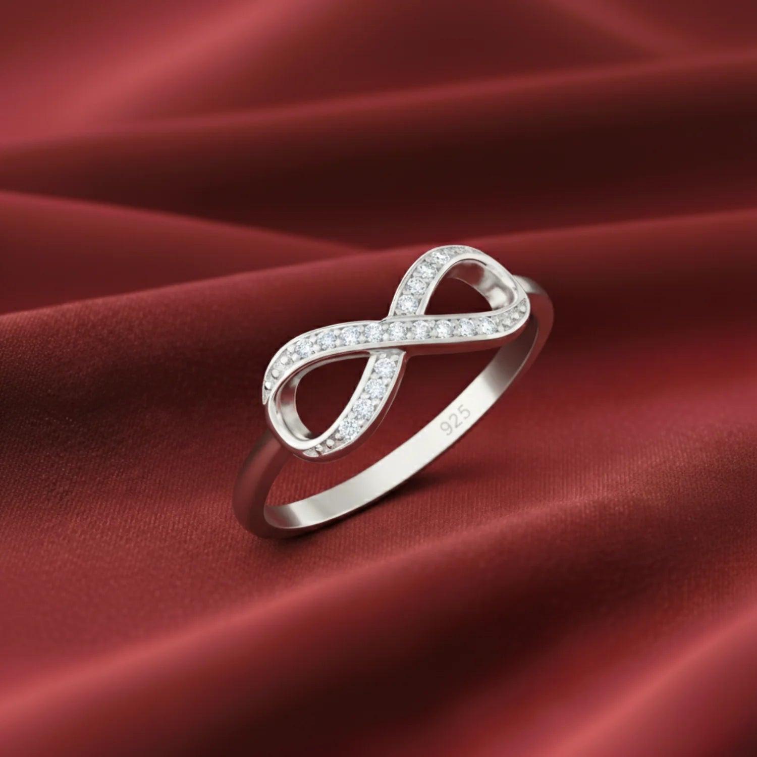 Sparkling Sterling Silver Infinity Ring with Simulated Diamonds – A Timeless Gift for Her on Any Occasion.