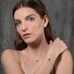 Elegant Adjustable Gold Plated Dainty Bracelet with Blue Stone for Women.