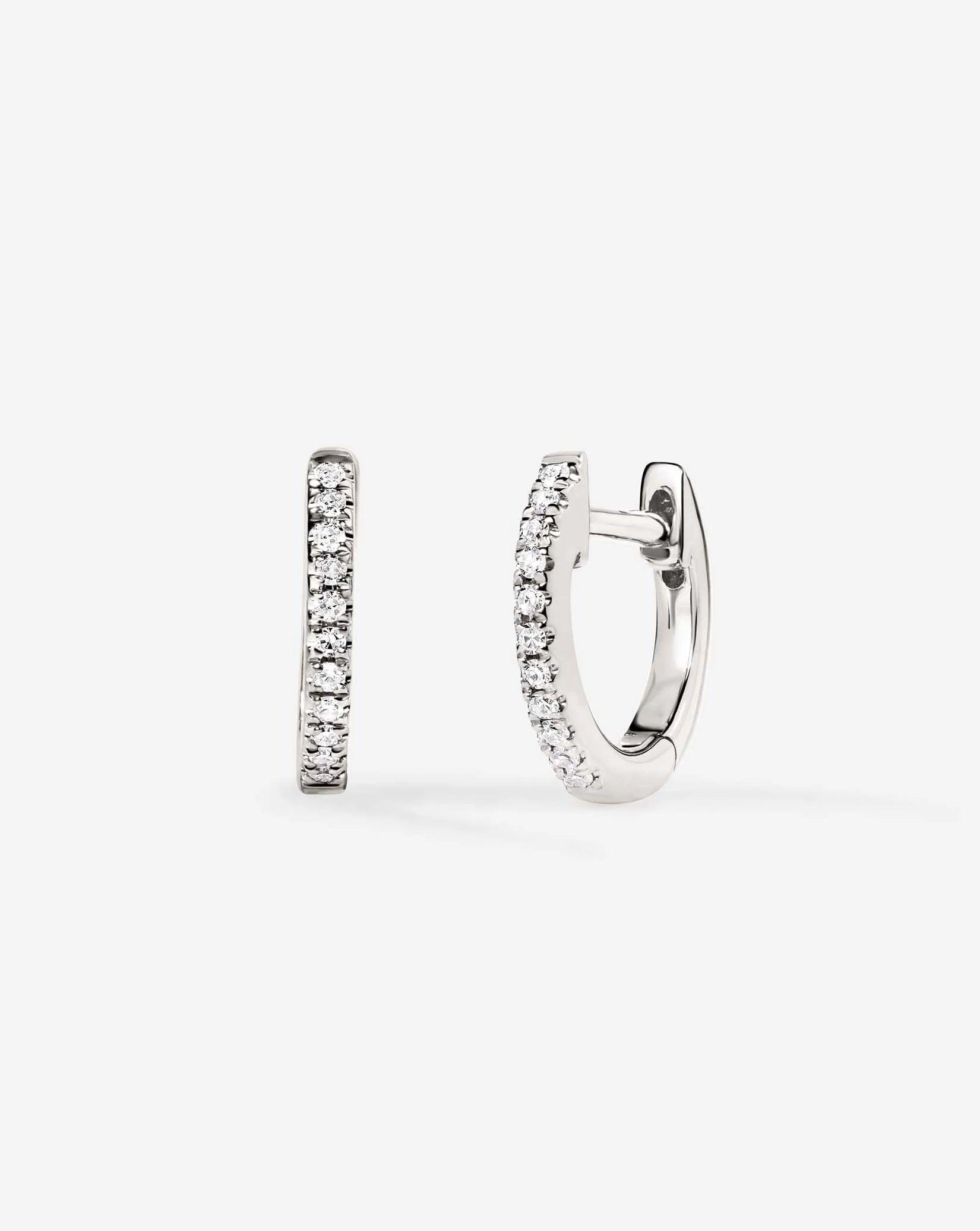 Charming Petite Diamond Huggie Earrings.