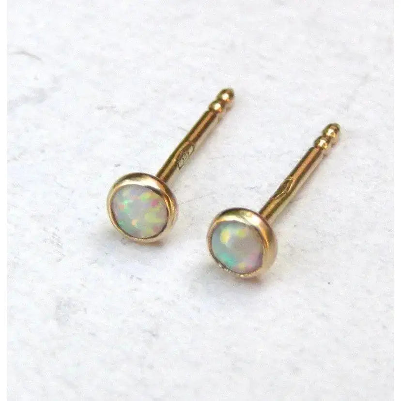 Dazzling 14K Yellow Gold Opal Stud Earrings - Adorable 3mm White Opal for Everyday Elegance and Special Occasions.
