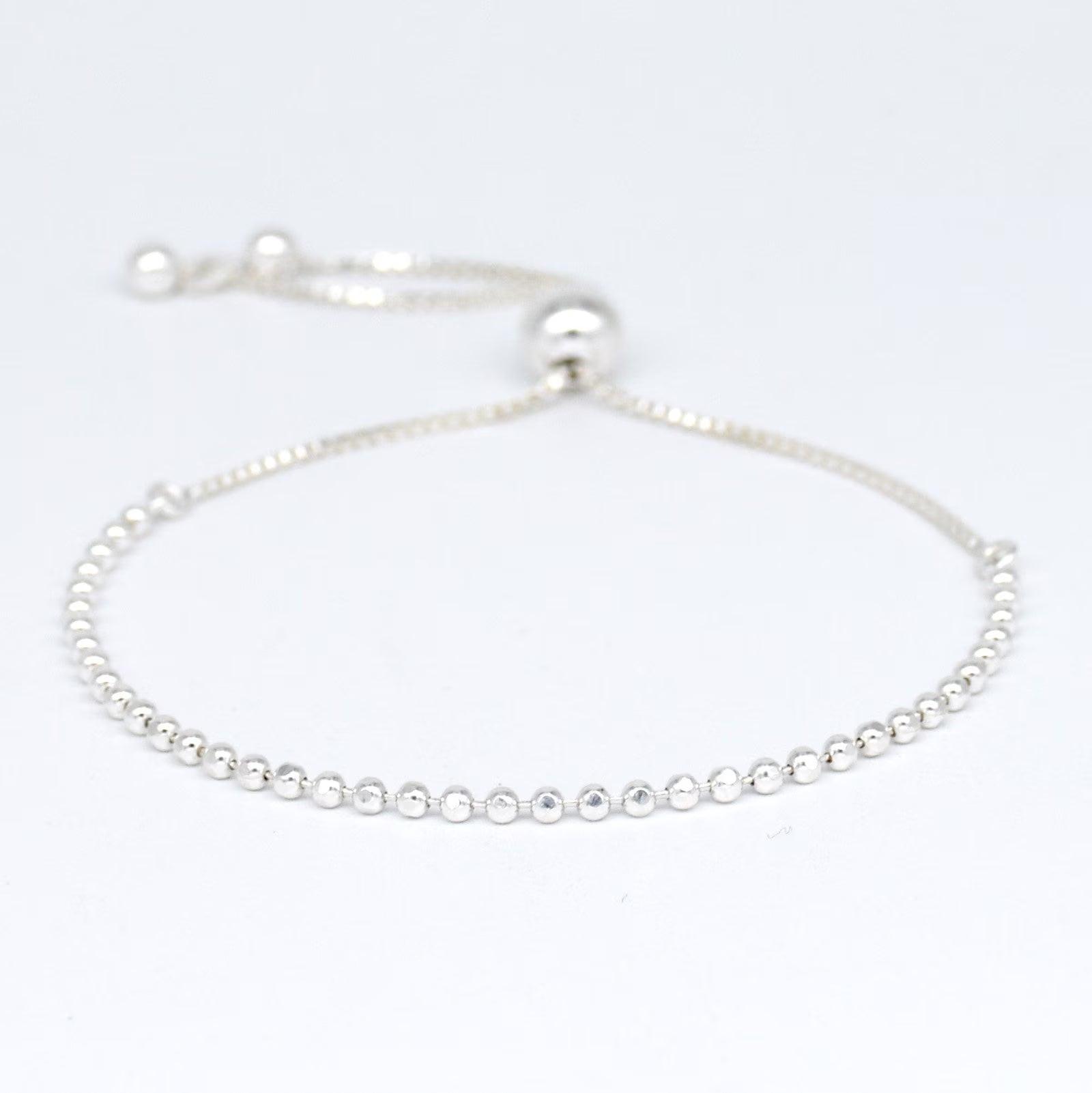 Elegant Sterling Silver Adjustable Minimalist Slider Bracelet with 2mm Beads for Women.