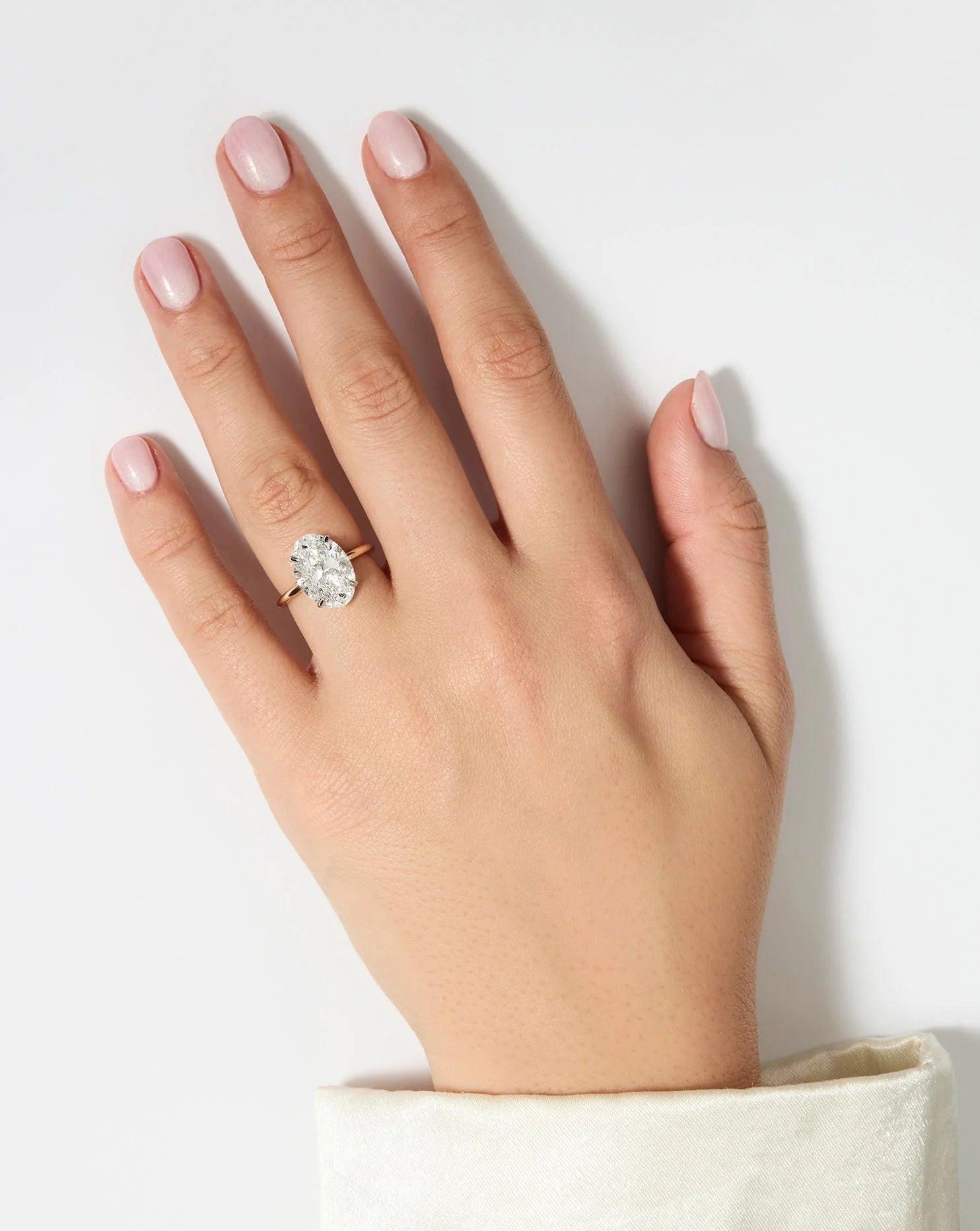Stunning 4.01 Carat Oval Lab Diamond Cloud Solitaire Ring.