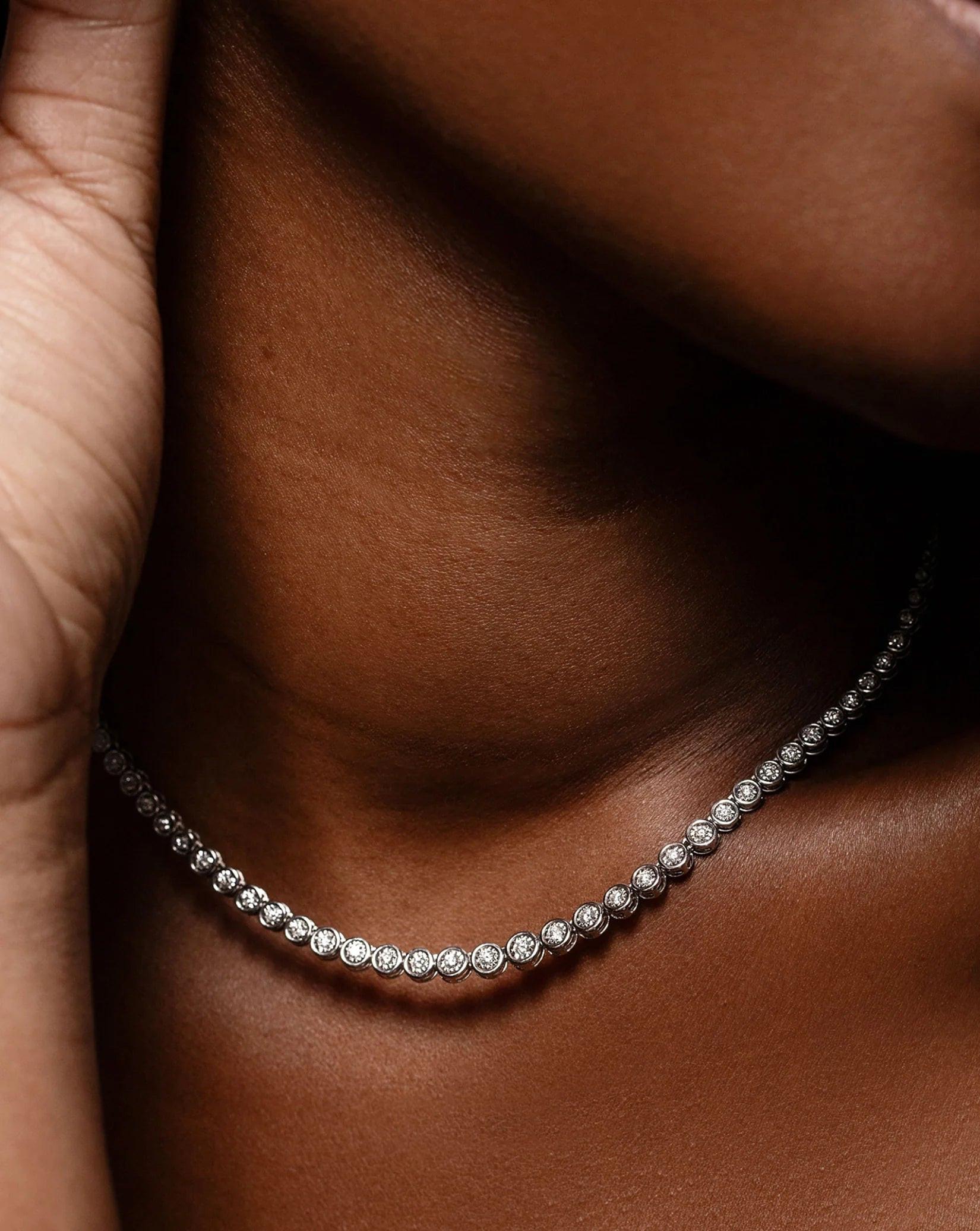 Stunning Graduated Bezel Diamond Tennis Necklace - Elevate Your Elegance.