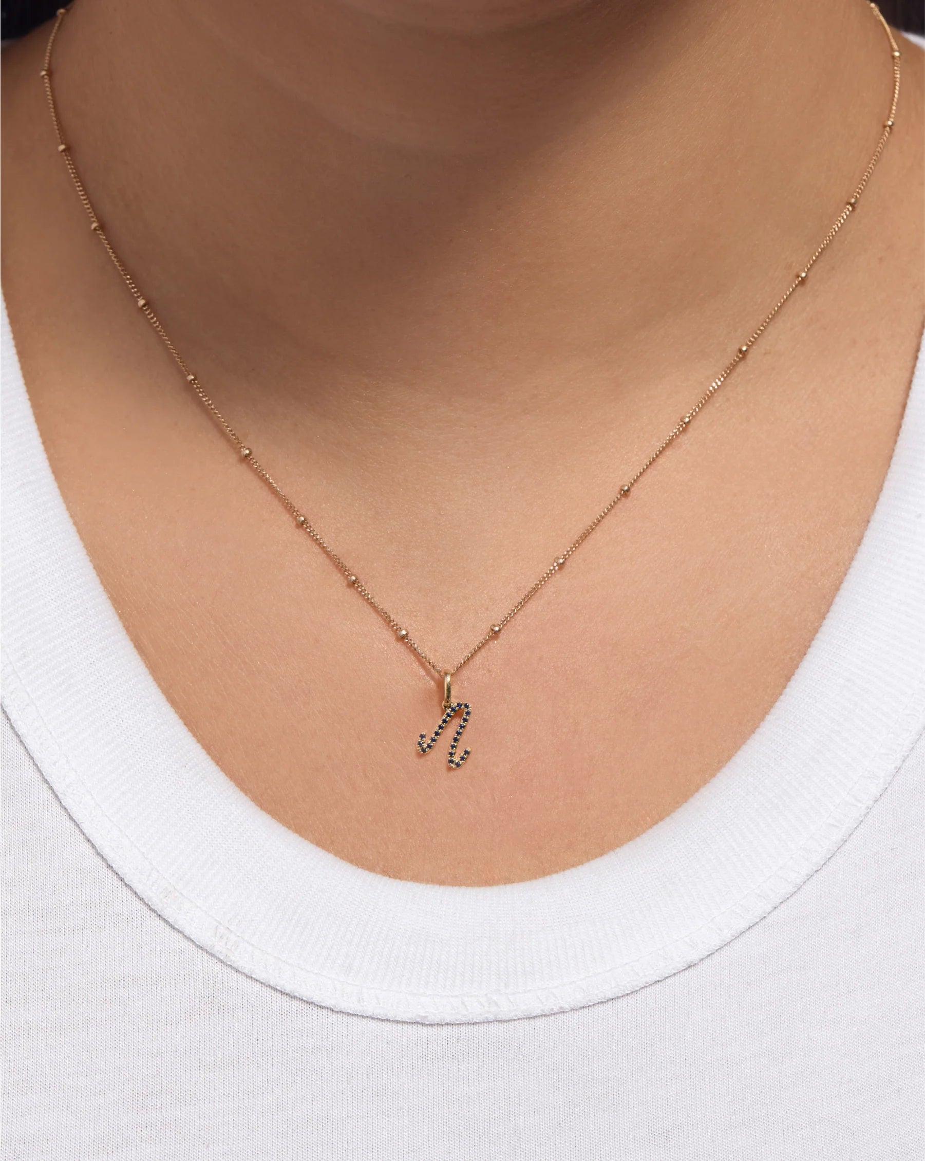 Personalized Gemstone Initial Pendant - Customizable Elegance.
