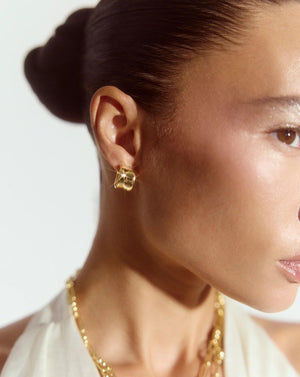 Elegant Liquid Gold Earrings – Elevate Your Style.