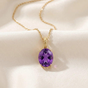 Elegant 14K Yellow Gold Oval Purple Amethyst Pendant Necklace.