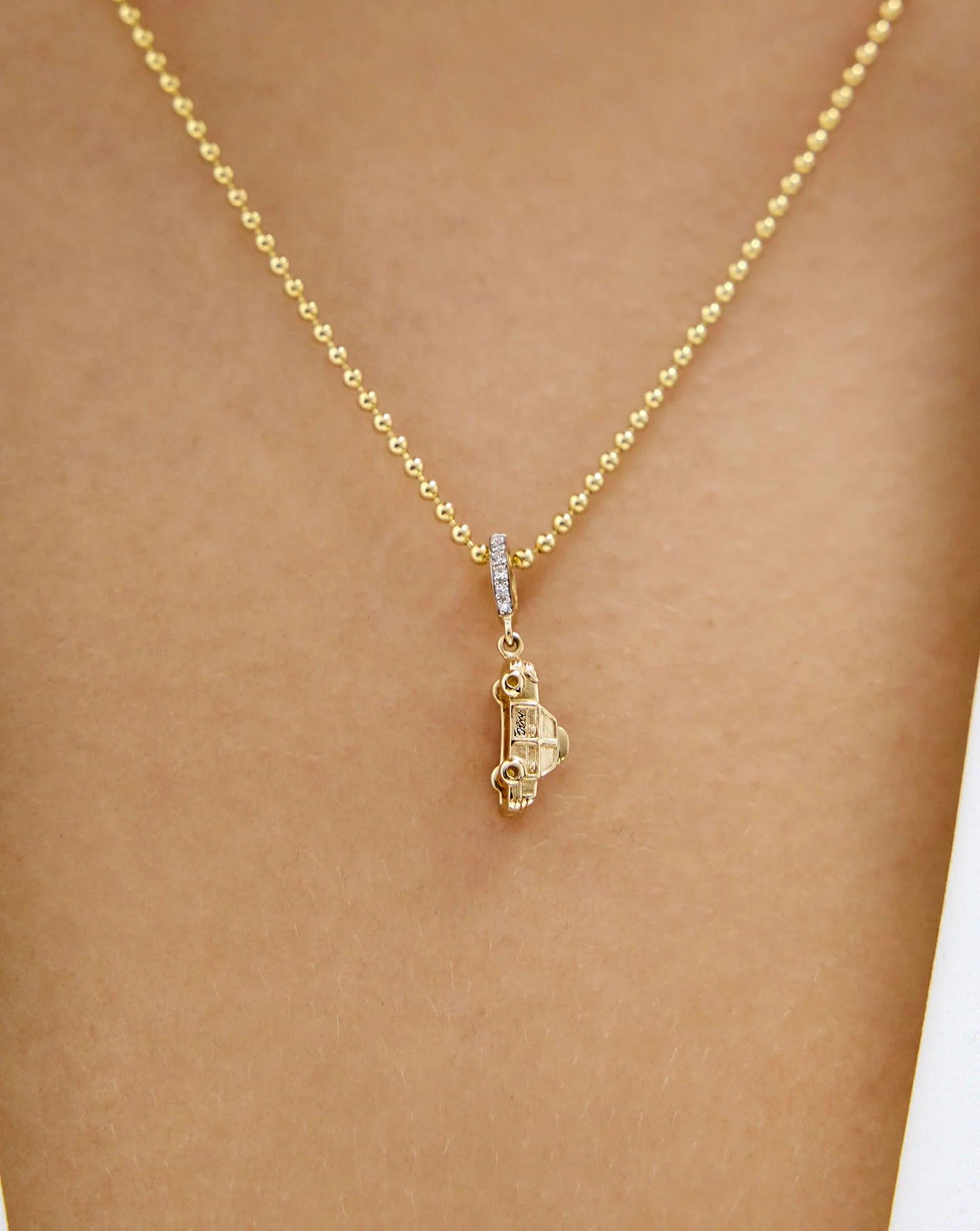 Charming NY Taxi Pendant - A Touch of City Spirit!.