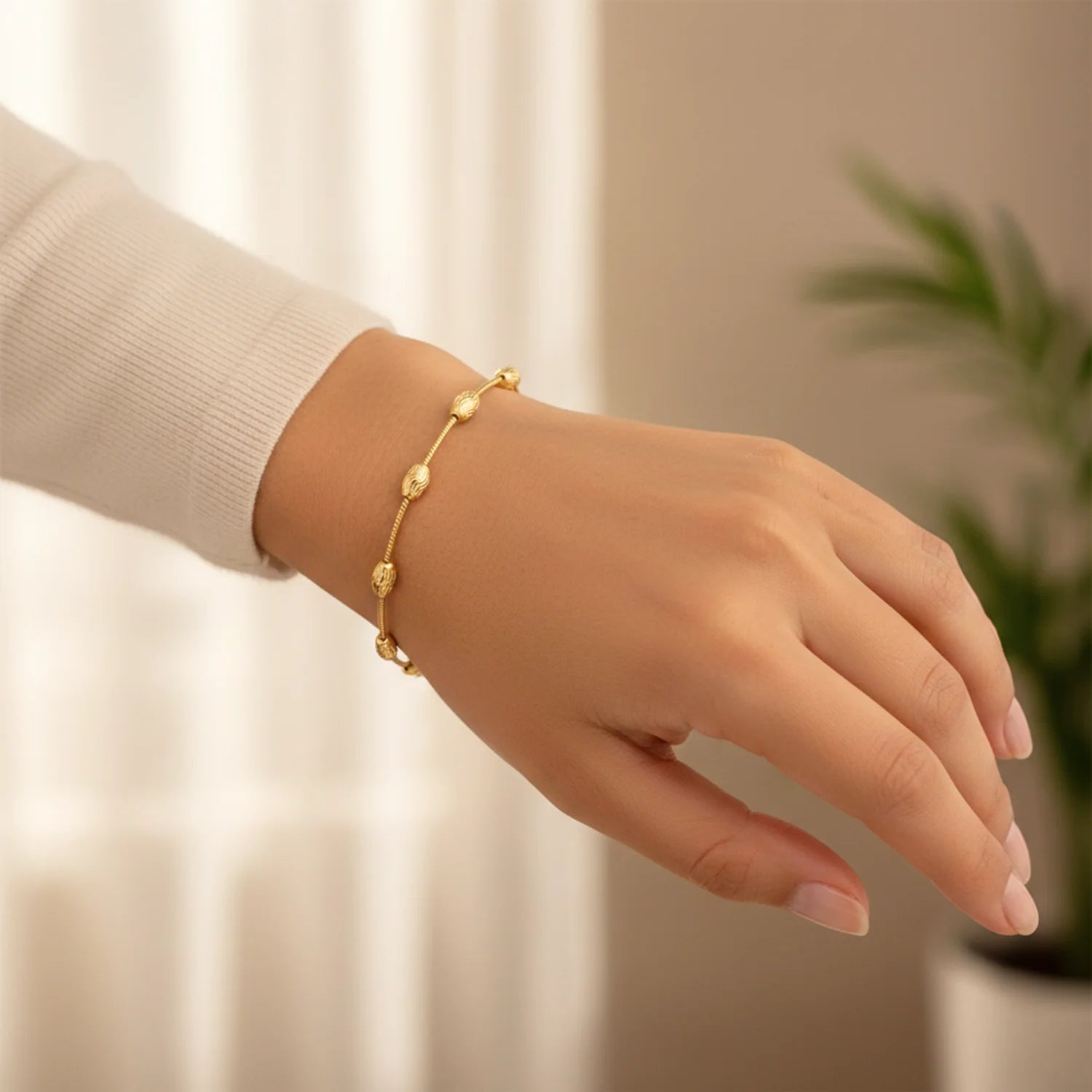Sterling Silver Gold Plated Diamond-Cut Oval Bead Bracelet