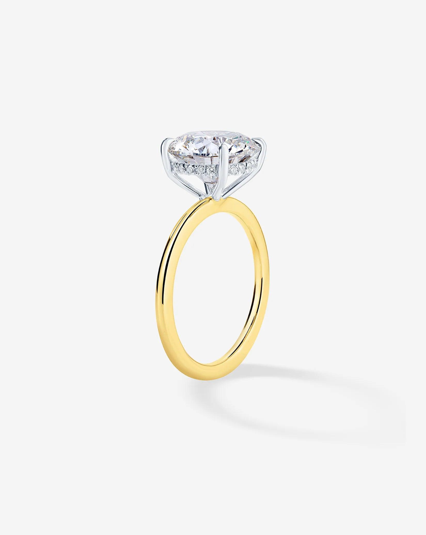 Stunning 4.11 Carat Lab Diamond with Whisper Thin® Hidden Halo.