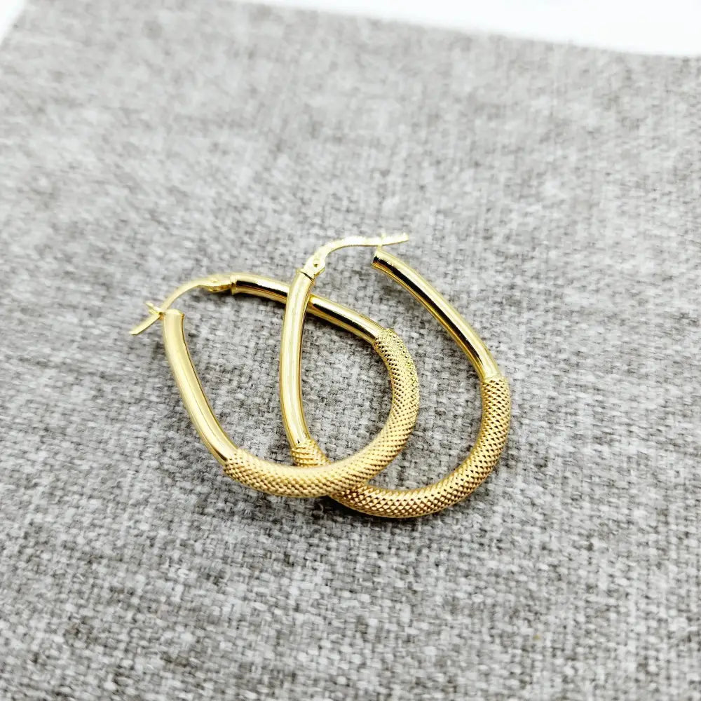 Elegant 10K Yellow Gold Textured Oval Hoop Earrings - Timeless Everyday Style.