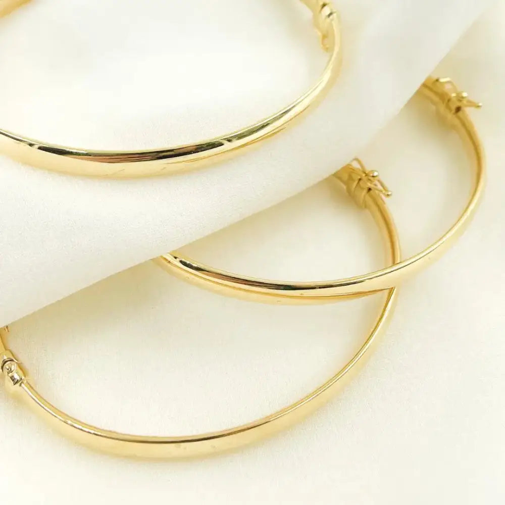 Elegant 14K Solid Gold Hinged Bangle Bracelet - 7 Inch Hollow Smooth Stackable Design.