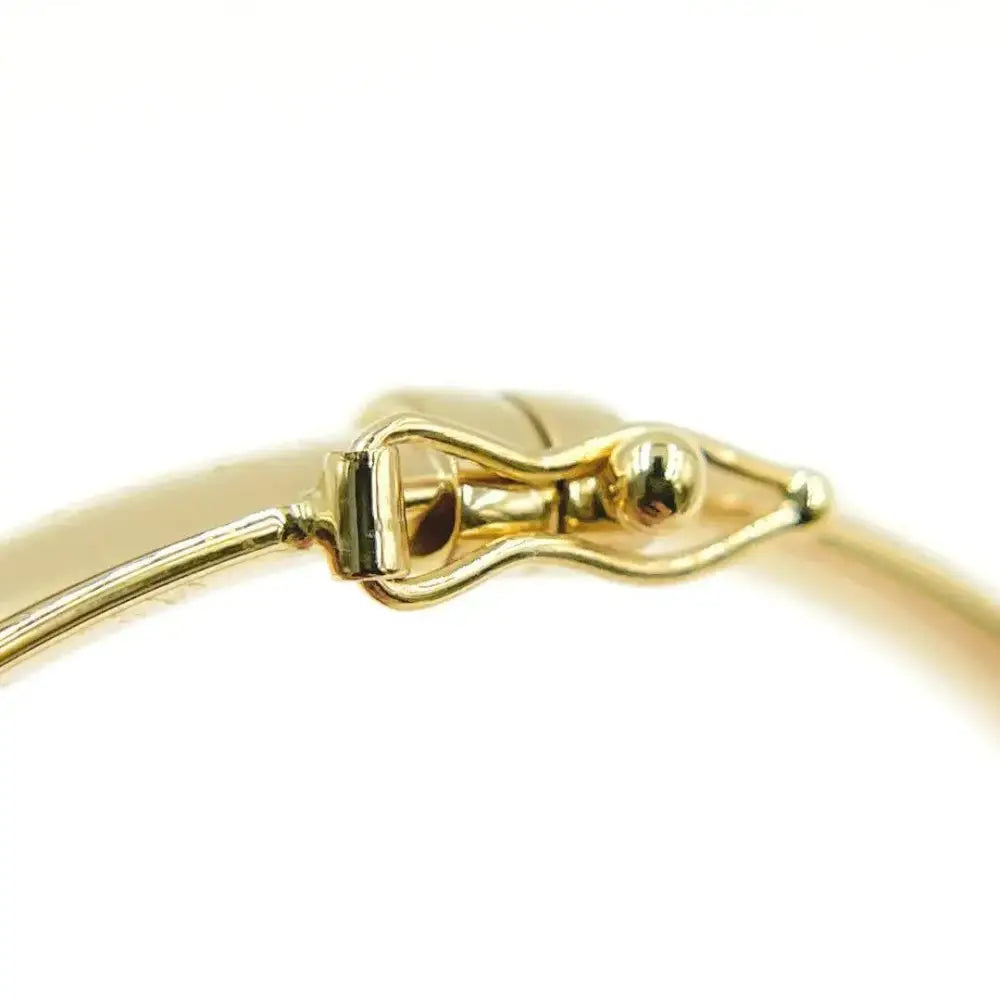Elegant 14K Solid Gold Hinged Bangle Bracelet - 7 Inch Hollow Smooth Stackable Design.