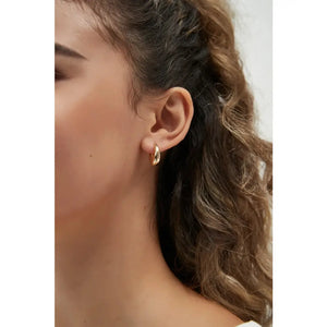 Elegant 14K Solid Gold Tapered Oval Huggie Hoop Earrings for Daily Wear.