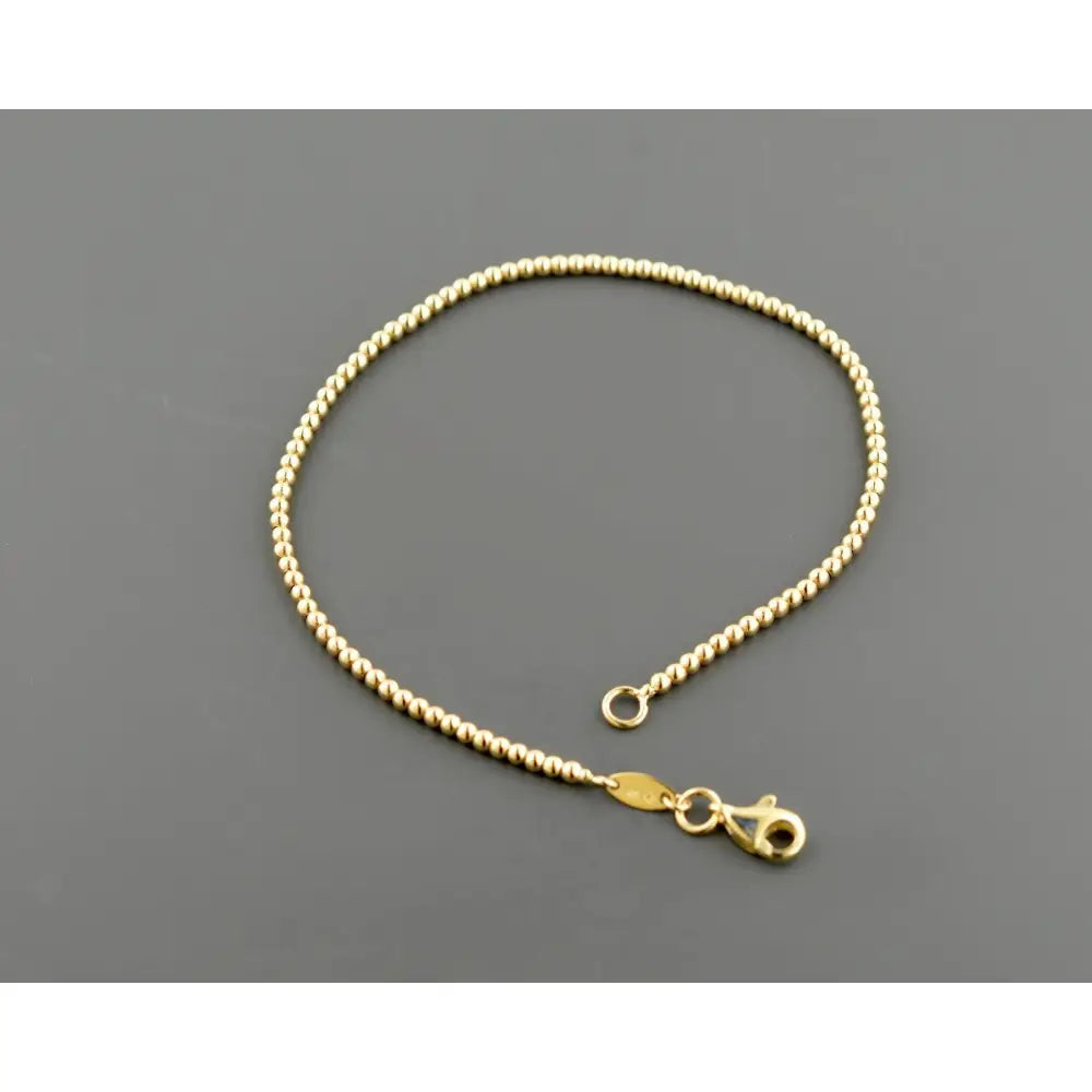 Elegant 14K Yellow Gold 2.0mm Bead Bracelet – 7.5 Inch with Secure Lobster Clasp.