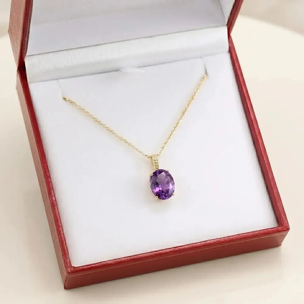 Elegant 14K Yellow Gold Oval Purple Amethyst Pendant Necklace.