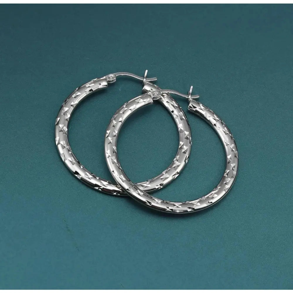 Elegant 35mm Sterling Silver Skinny Hoop Earrings.
