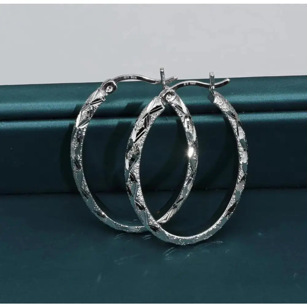 Elegant 925 Sterling Silver Hand Engraved Diamond Cut Hoop Earrings.