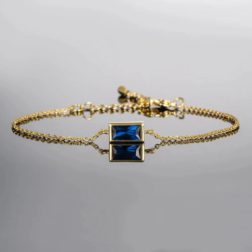 Elegant Adjustable Gold Plated Dainty Bracelet with Blue Stone for Women.