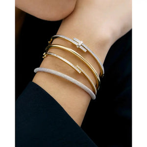 Elegant Baguette and Round Diamond Wrap Bangle.
