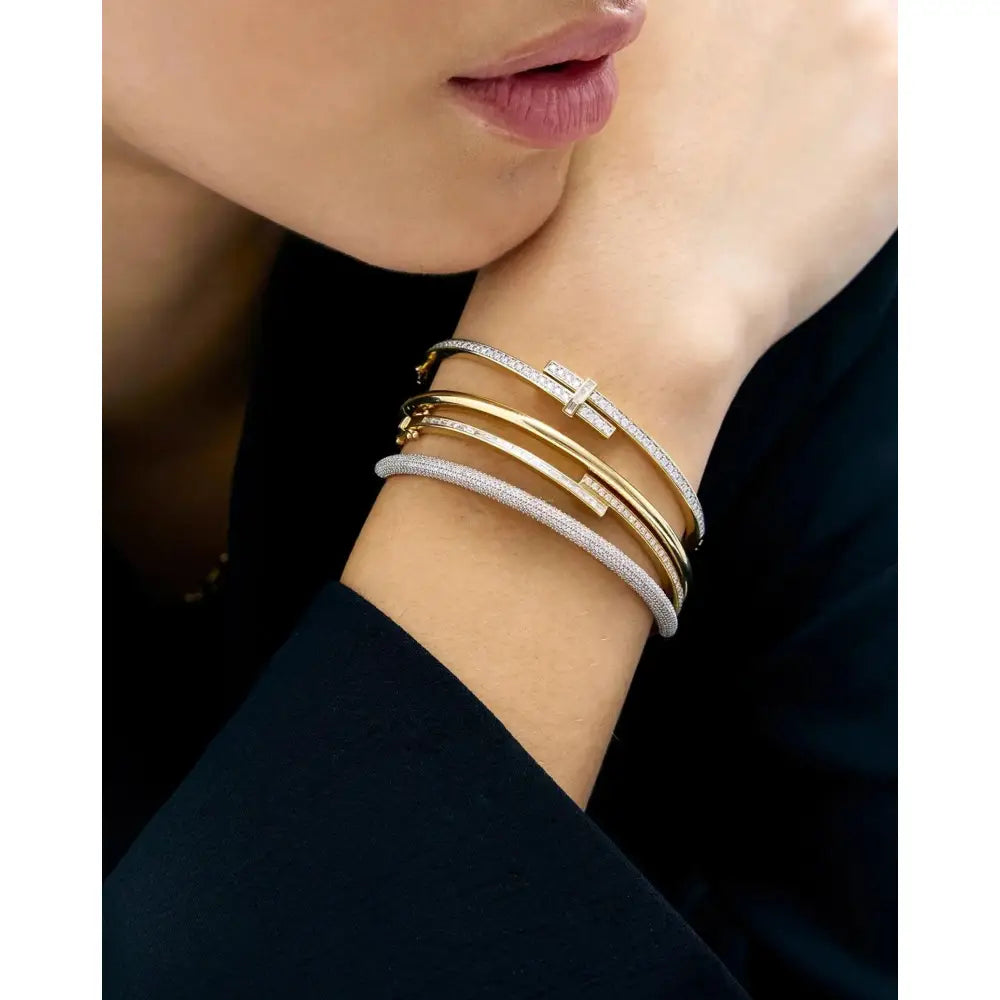 Elegant Baguette and Round Diamond Wrap Bangle.