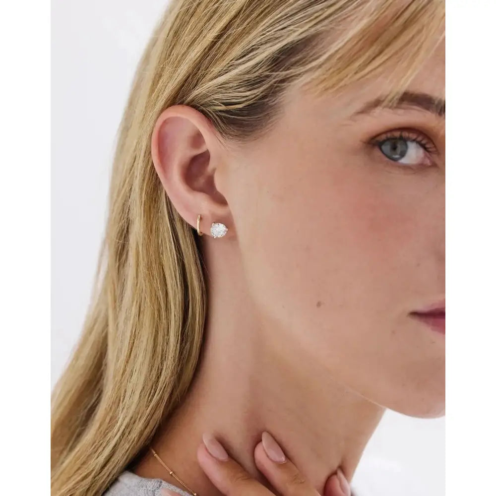 Elegant Classic Gold Huggie Earrings for Timeless Style.