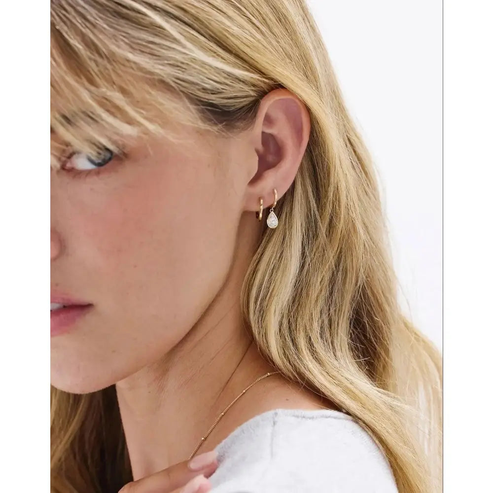 Elegant Classic Gold Huggie Earrings for Timeless Style.