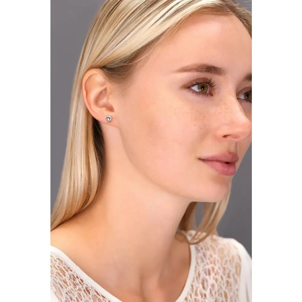 Elegant CZ Teardrop Stud Earrings in Sterling Silver.