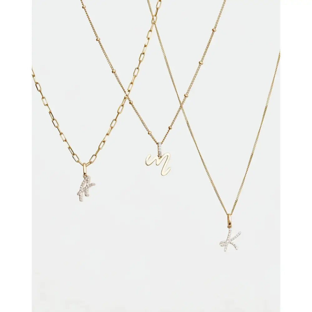Elegant Diamond Initial Pendant - Personalize Your Style!.