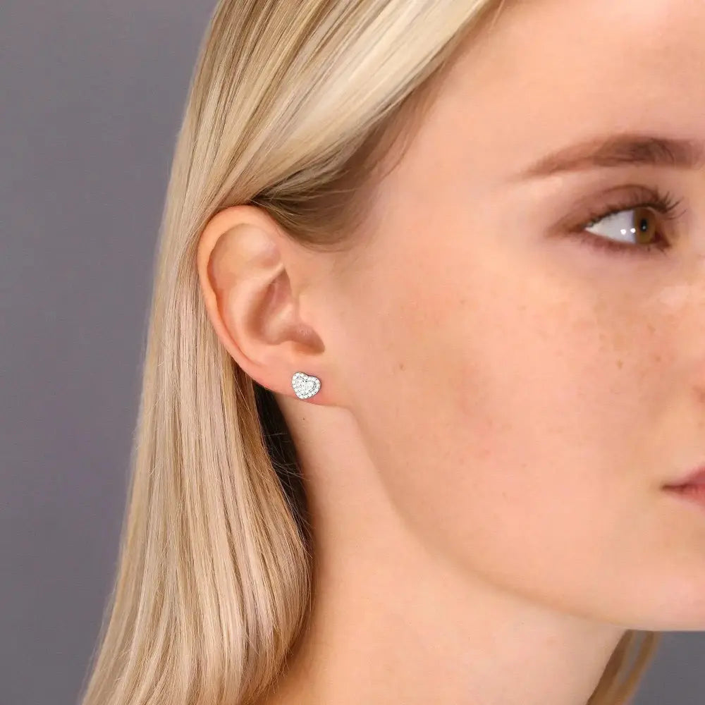 Elegant Double Heart CZ Stud Earrings in Sterling Silver.
