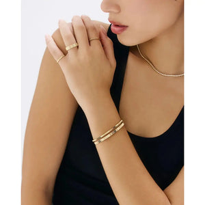 Elegant Fluted Gold Bangle - Timeless Luxury Accessory.