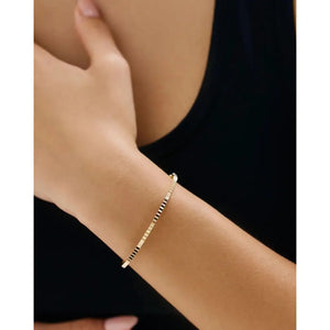 Elegant Fluted Gold Bangle - Timeless Luxury Accessory.