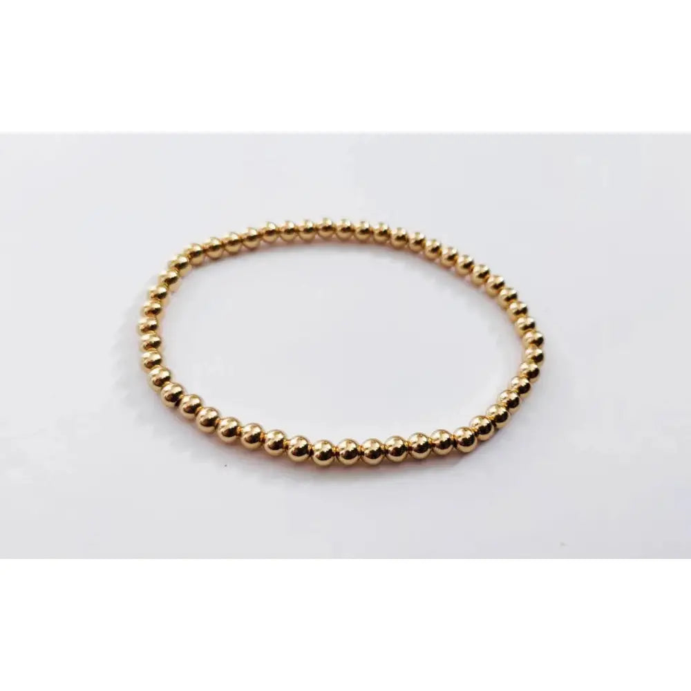 Elegant Gold Rose Silver Beaded Stacking Bracelets - 14K Gold Plated Elastic Design.