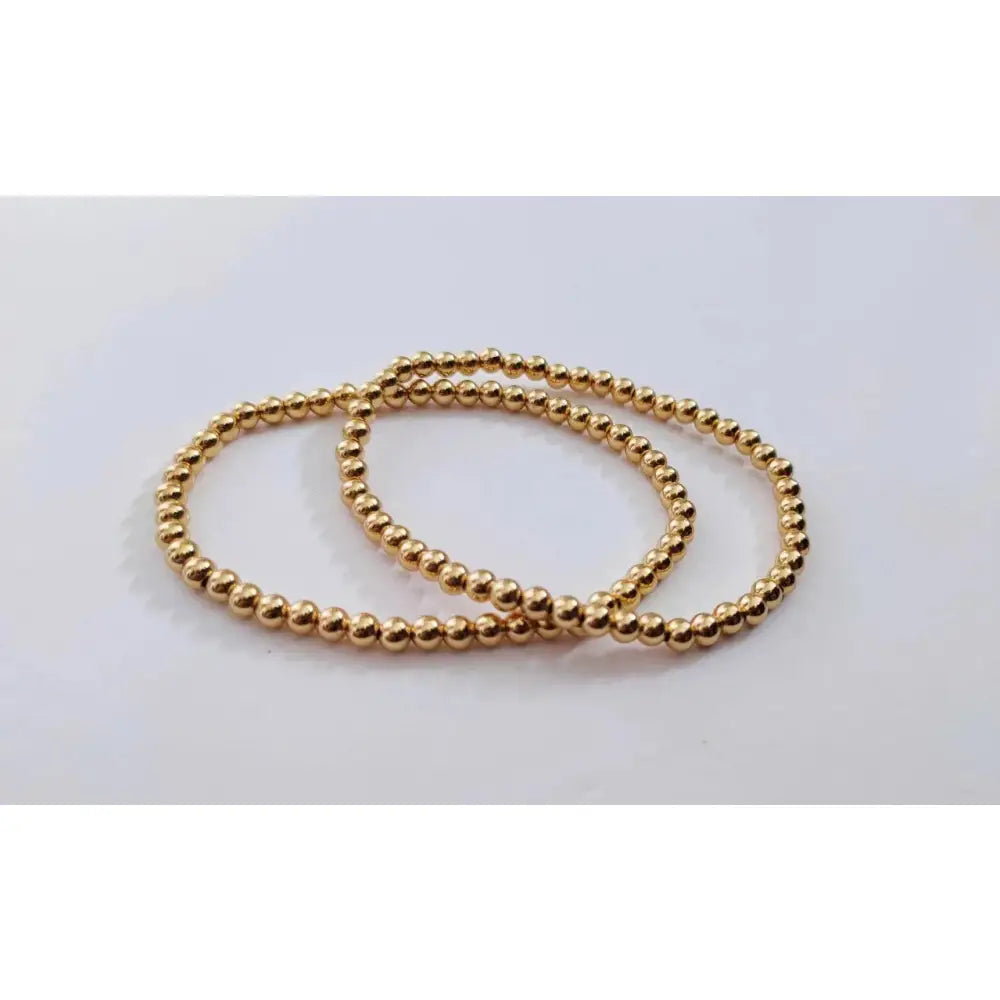 Elegant Gold Rose Silver Beaded Stacking Bracelets - 14K Gold Plated Elastic Design.