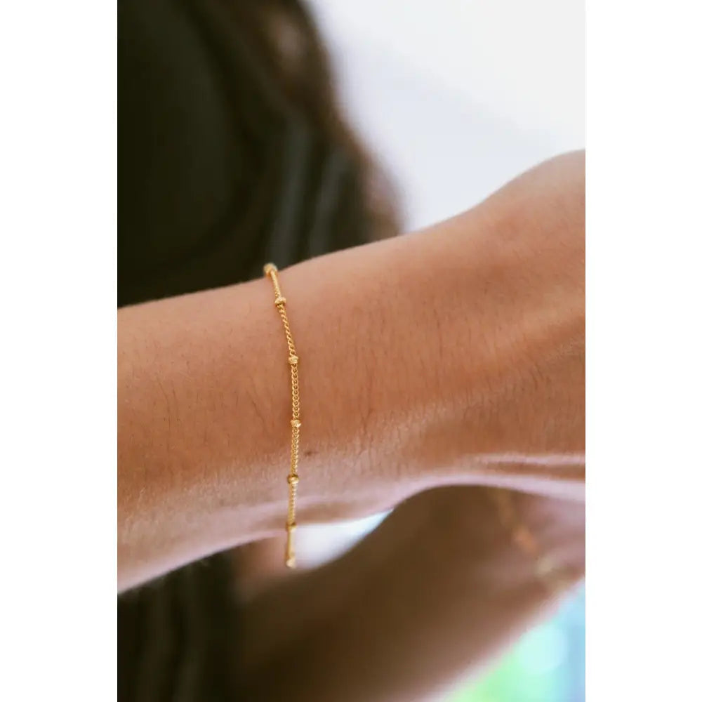 Elegant Gold Satellite Bracelet - Dainty Beaded Chain for a Minimalist Gift She'll Adore.