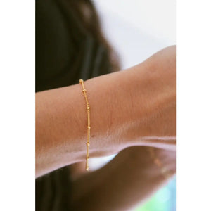Elegant Gold Satellite Bracelet - Dainty Beaded Chain for a Minimalist Gift She'll Adore.