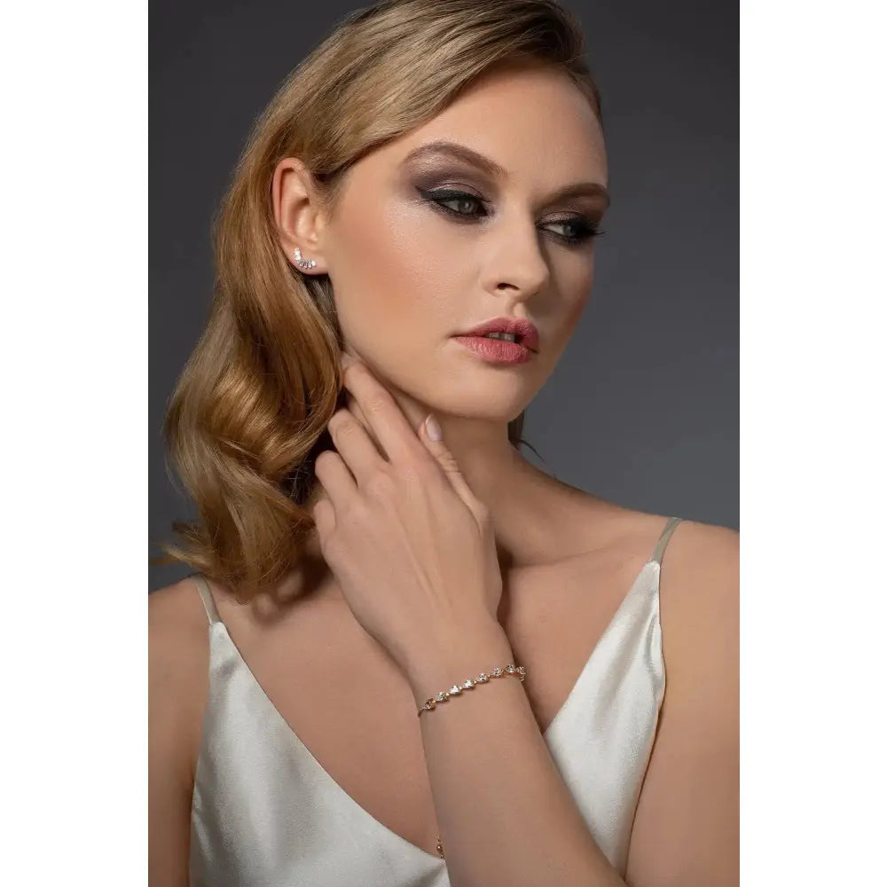 Elegant Gold Slider Bracelet with Dainty Pear-Shaped Cubic Zirconia for Women and Girls.