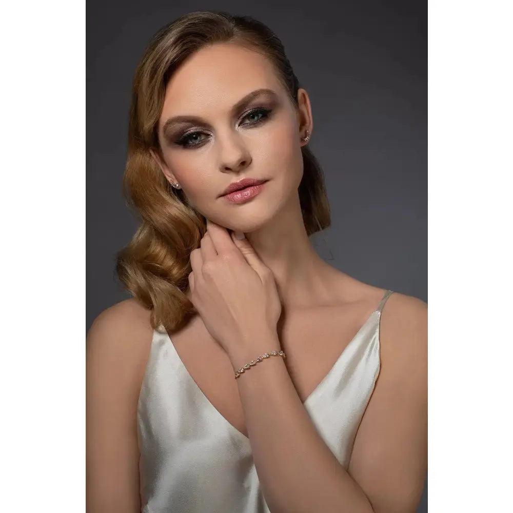 Elegant Gold Slider Bracelet with Dainty Pear-Shaped Cubic Zirconia for Women and Girls.