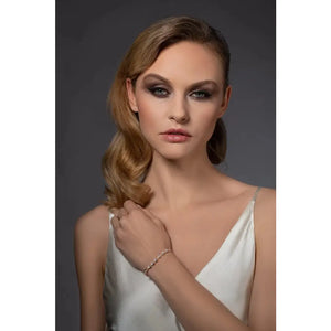 Elegant Gold Slider Bracelet with Dainty Pear-Shaped Cubic Zirconia for Women and Girls.