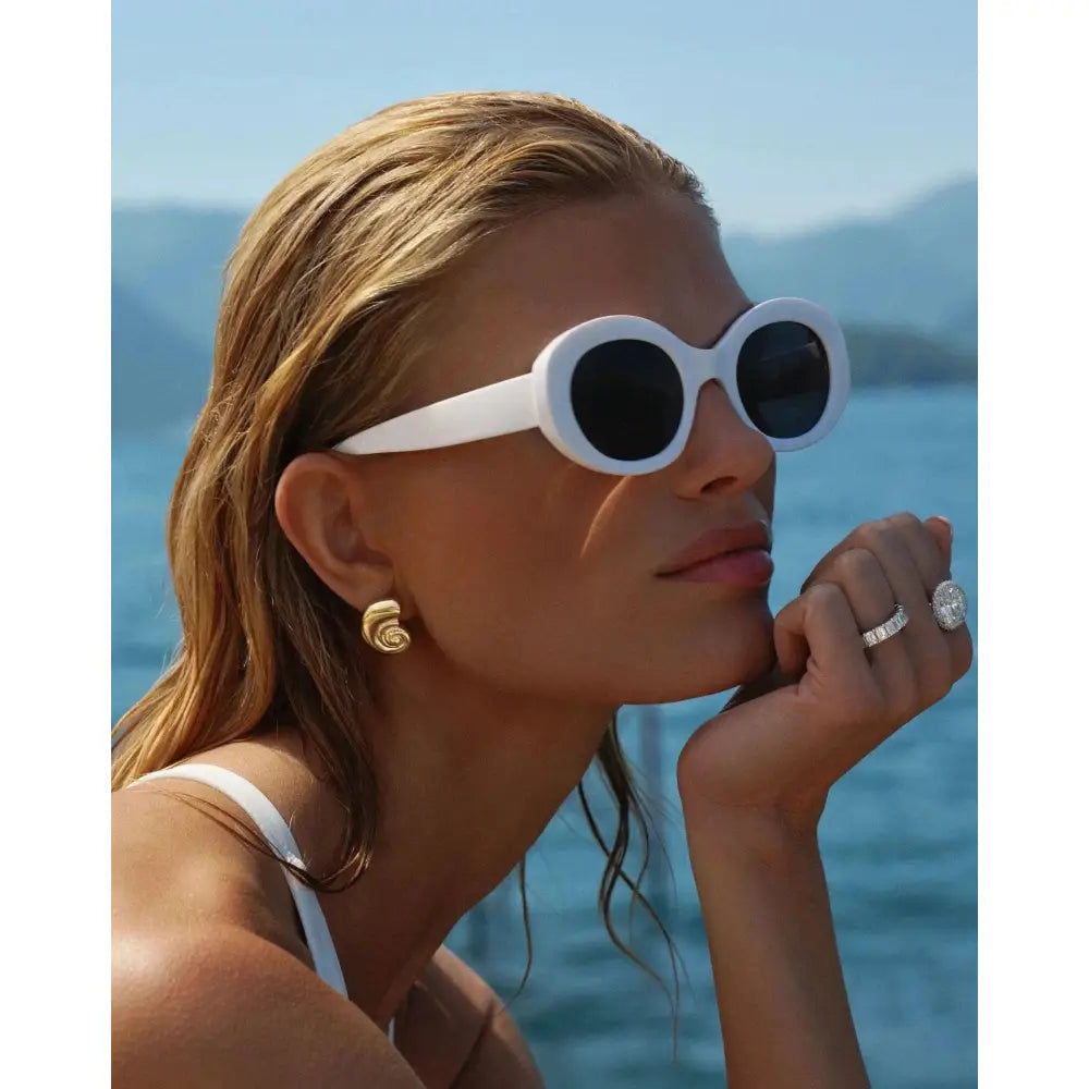 Elegant Nautilus Shell Earrings for a Coastal Chic Look.