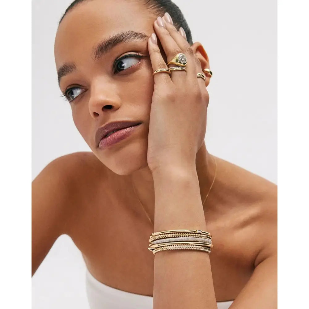 Elegant Stackable Gold Cloud Bangle - Elevate Your Style.