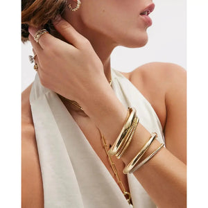 Elegant Stackable Gold Cloud Bangle - Elevate Your Style.